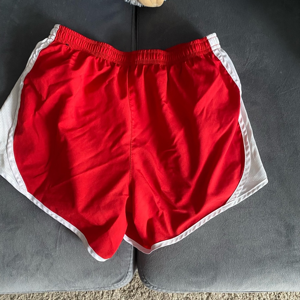kids red nike shorts. size large.